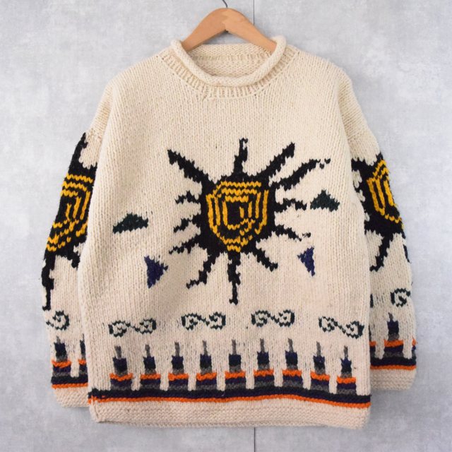 太陽柄編み ロールネックウールニットセーター